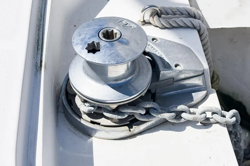 Slide: The Image of Anchor windlass on a 2007 Hunter 38 sailboat with chain and rope. - 28