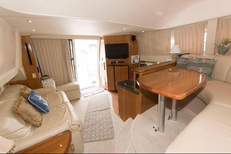 Slide: The Image of Luxurious interior of a 2005 Carver 360 Sport Sedan yacht with elegant furnishings. - 4