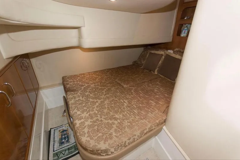Slide: The Image of 2005 Carver 360 Sport Sedan cabin with cozy bed and elegant decor. - 7