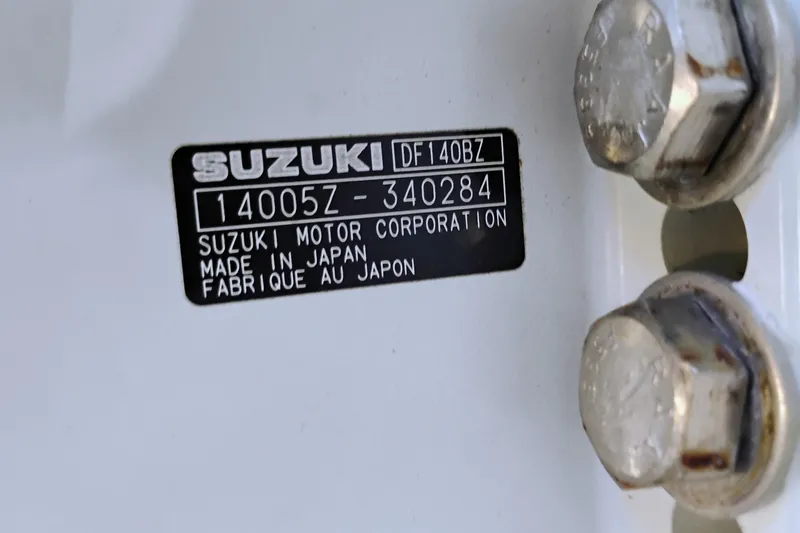 Slide: The Image of Label on Suzuki motor, model DF140BZ, made in Japan, attached to Clearwater 2500 Center Console. - 13