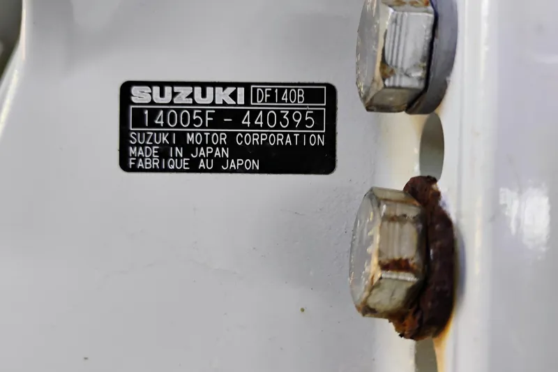 Slide: The Image of Label on Suzuki DF140B engine, Clearwater 2500 Center Console 2024 boat. - 14