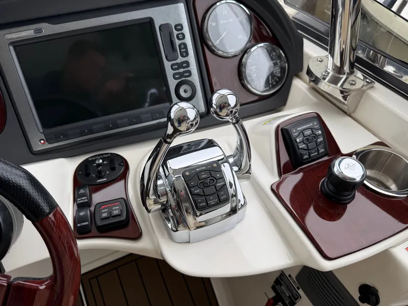 Slide: The Image of Control console of a 2012 Meridian 441 Sedan boat. - 10