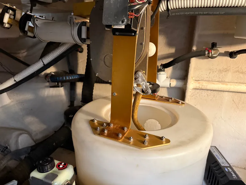 Slide: The Image of Interior of a 2012 Meridian 441 Sedan boat, showing technical details. - 24