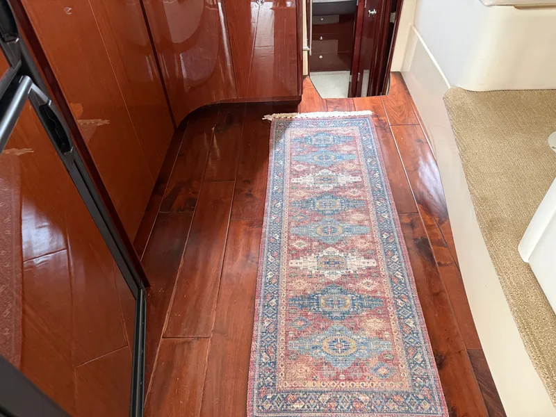 Slide: The Image of Rug runner on wooden floor in a Meridian 441 Sedan yacht. - 36