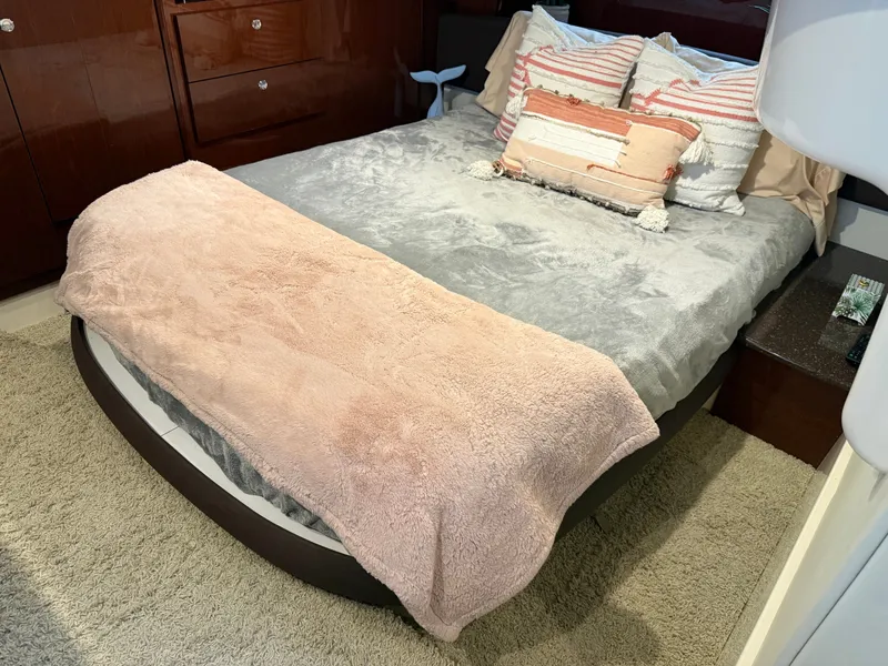 Slide: The Image of Interior of a 2012 Meridian 441 Sedan yacht with cozy bed. - 43