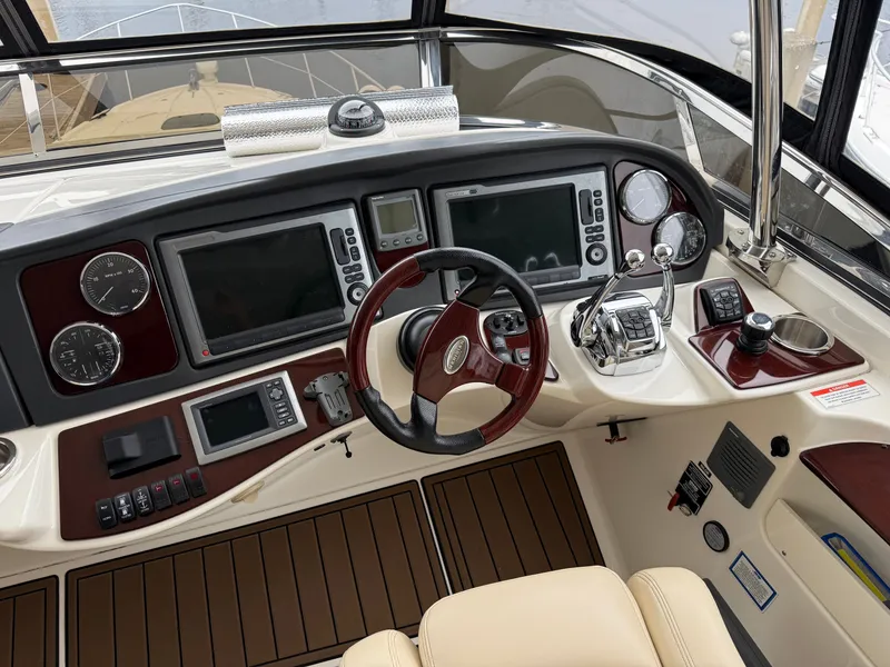Slide: The Image of Interior view of 2012 Meridian 441 Sedan cockpit with controls and instruments. - 8