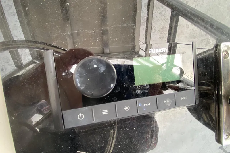 Slide: The Image of Fusion Bluetooth stereo system on a 2000 Parker 1801 Center Console boat. - 11