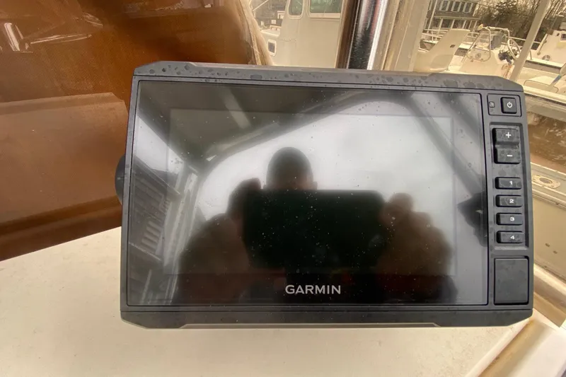 Slide: The Image of Garmin marine GPS device on a 2000 Parker 1801 Center Console boat. - 9