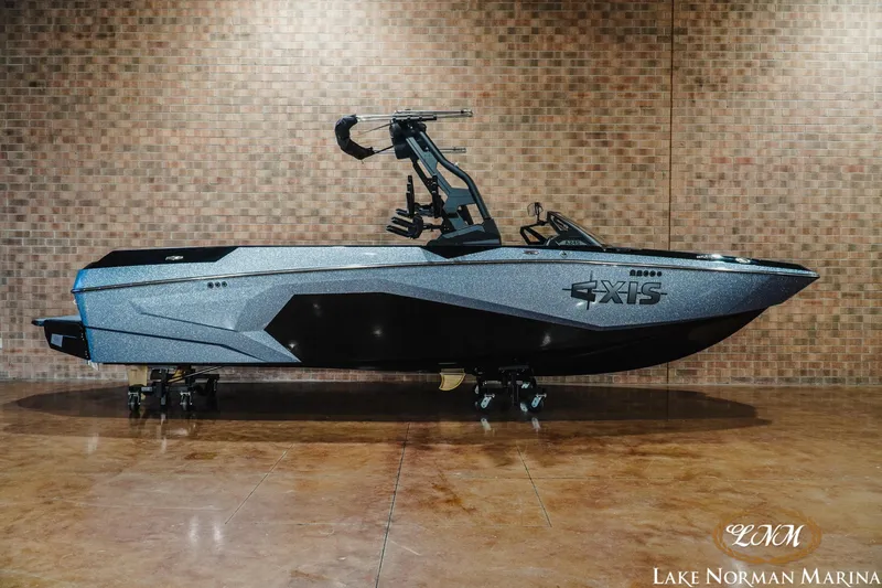 The Image of 2026 Axis A245 boat displayed indoors at Lake Norman Marina. - 1