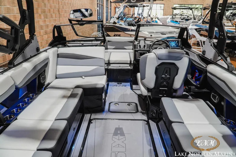Slide: The Image of Luxurious interior of 2026 Axis A245 boat with modern seating and advanced dashboard. - 12