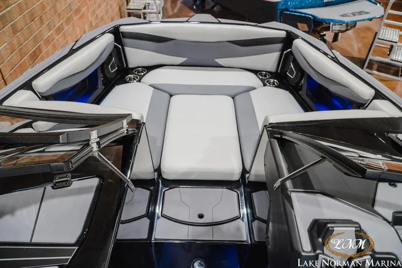 Slide: The Image of 2026 Axis A245 boat interior with luxurious seating at Lake Norman Marina. - 17