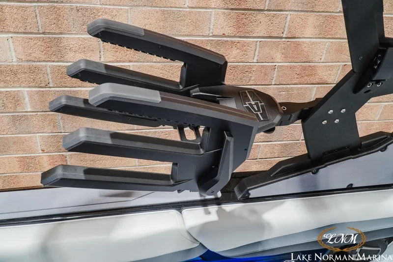 Slide: The Image of 2026 Axis A245 boat accessory against brick wall at Lake Norman Marina. - 21