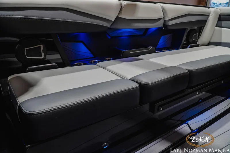 Slide: The Image of Luxurious seating in 2026 Axis A245 boat with ambient blue lighting. - 23