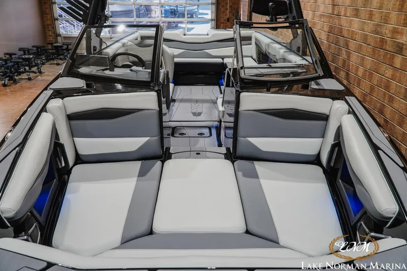 Slide: The Image of 2026 Axis A245 boat interior with sleek gray seating and modern design at Lake Norman Marina. - 6