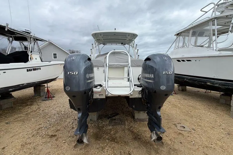 Slide: The Image of 2019 World Cat 255 DC boat with twin Yamaha 150 engines on display. - 23