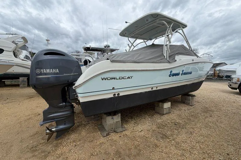 Slide: The Image of 2019 World Cat 255 DC boat with Yamaha engine on dry dock. - 4