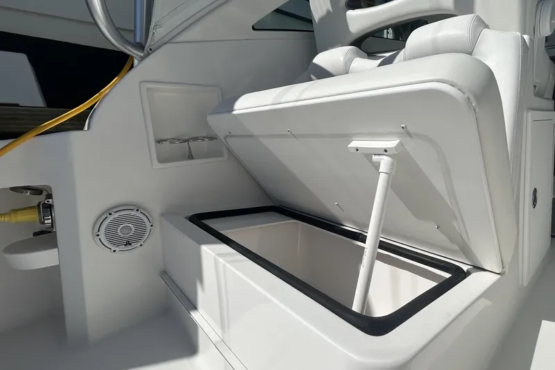 Slide: The Image of Open storage compartment on 2018 Albemarle 29 Express boat interior. - 21