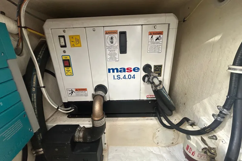 Slide: The Image of Engine room of 2018 Albemarle 29 Express featuring Mase I.S.4.04 generator. - 28