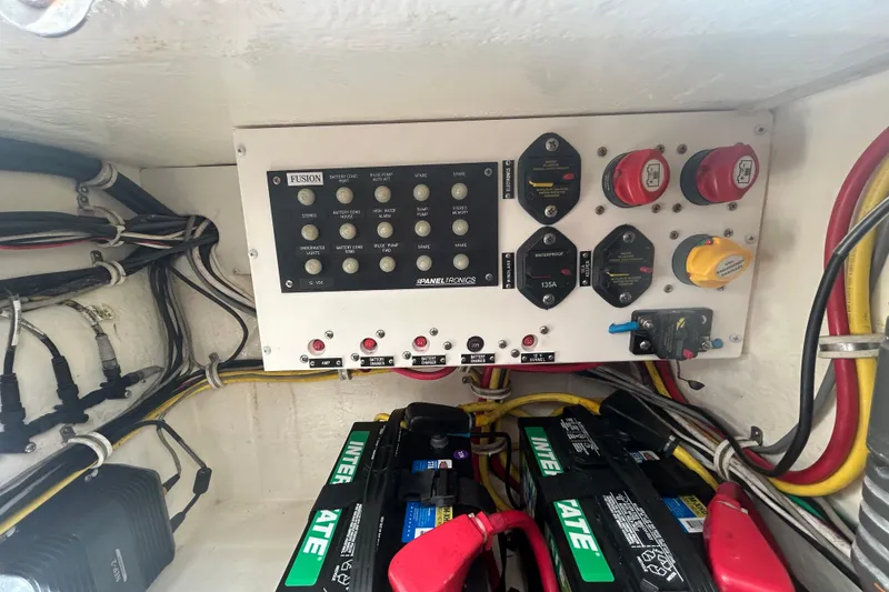 Slide: The Image of Electrical panel and battery setup in a 2018 Albemarle 29 Express boat. - 30
