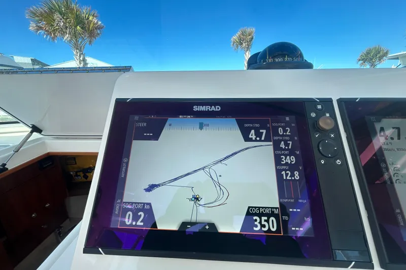 Slide: The Image of Simrad navigation display on 2018 Albemarle 29 Express boat, showing course and speed data. - 38
