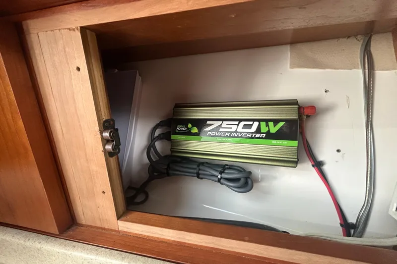 Slide: The Image of 750W power inverter inside 2018 Albemarle 29 Express boat cabinet. - 55