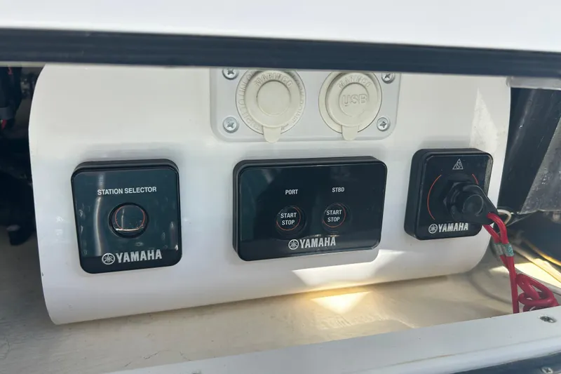 Slide: The Image of Yamaha control panel on 2018 Albemarle 29 Express boat with USB ports. - 66