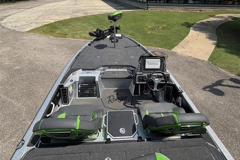 Slide: The Image of 2026 Ranger Z519R Cup-Equipped boat interior with advanced navigation system and seating. - 11