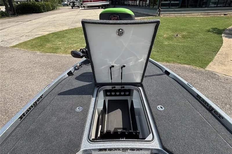 Slide: The Image of 2026 Ranger Z519R Cup-Equipped boat with open storage compartment on deck. - 10