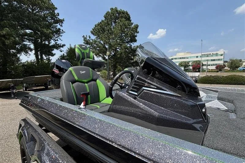 Slide: The Image of 2026 Ranger Z519R Cup-Equipped boat with sleek design and green-accented seats. - 25