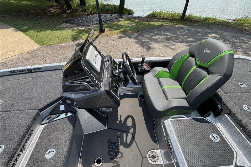 Slide: The Image of 2026 Ranger Z519R Cup-Equipped boat interior with advanced controls and comfortable seating. - 12