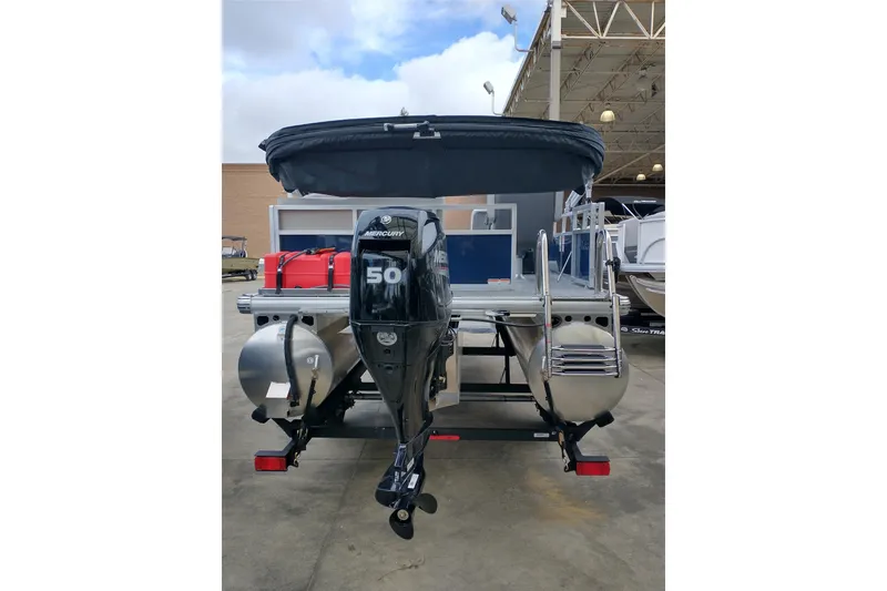 Slide: The Image of 2026 Sun Tracker Bass Buggy 16 XL Select pontoon boat with Mercury 50 engine. - 5
