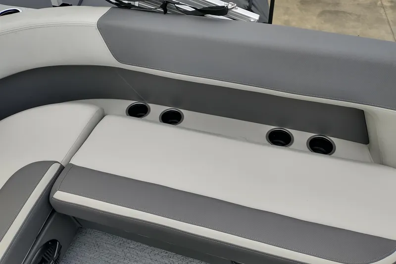 Slide: The Image of 2026 Sun Tracker Bass Buggy 16 XL Select interior seating with cup holders. - 9
