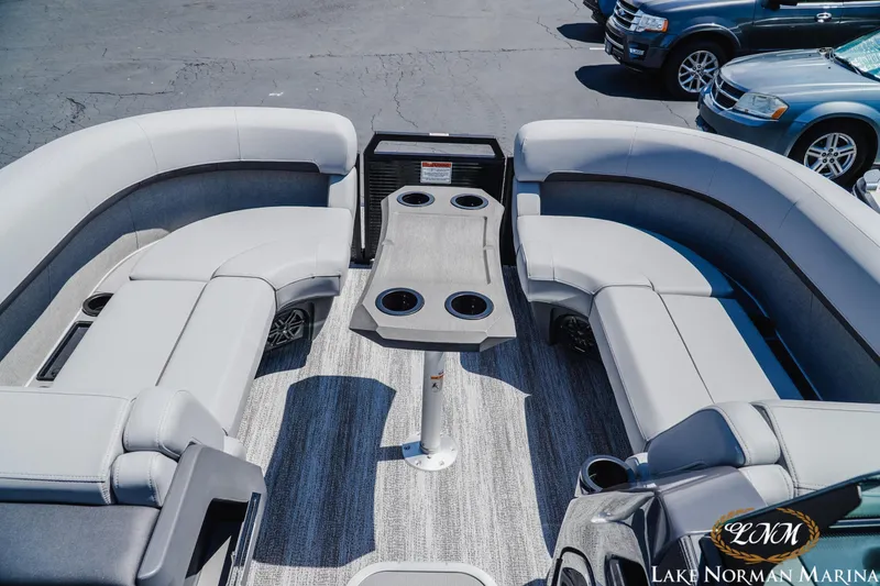 Slide: The Image of Luxurious seating area on a 2026 Bennington 23MSB pontoon boat at Lake Norman Marina. - 11