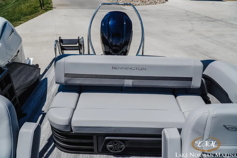 Slide: The Image of 2026 Bennington 23MSB boat interior with plush seating at Lake Norman Marina. - 17