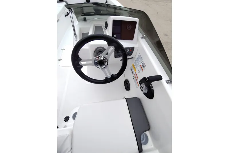 Slide: The Image of 2026 Tahoe T18 boat cockpit with steering wheel and control panel. - 5
