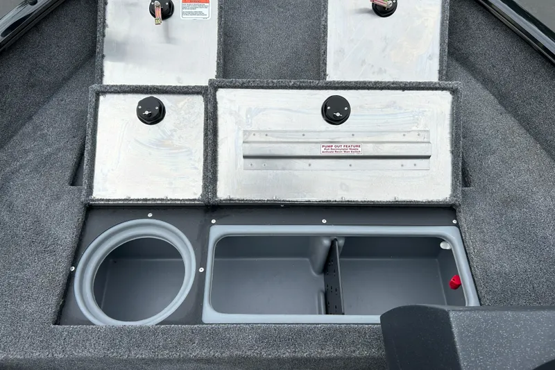 Slide: The Image of 2026 Tracker Pro Guide V-16 SC boat storage compartments with pump-out feature. - 19