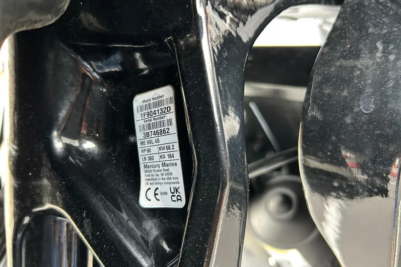 Slide: The Image of Label on a 2026 Tracker Pro Guide V-16 SC boat engine. - 68