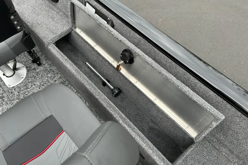 Slide: The Image of Interior of 2026 Tracker Pro Guide V-16 SC boat with storage compartment. - 12