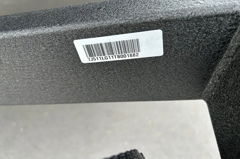 Slide: The Image of Barcode sticker on 2026 Tracker Pro Guide V-16 SC boat surface. - 69