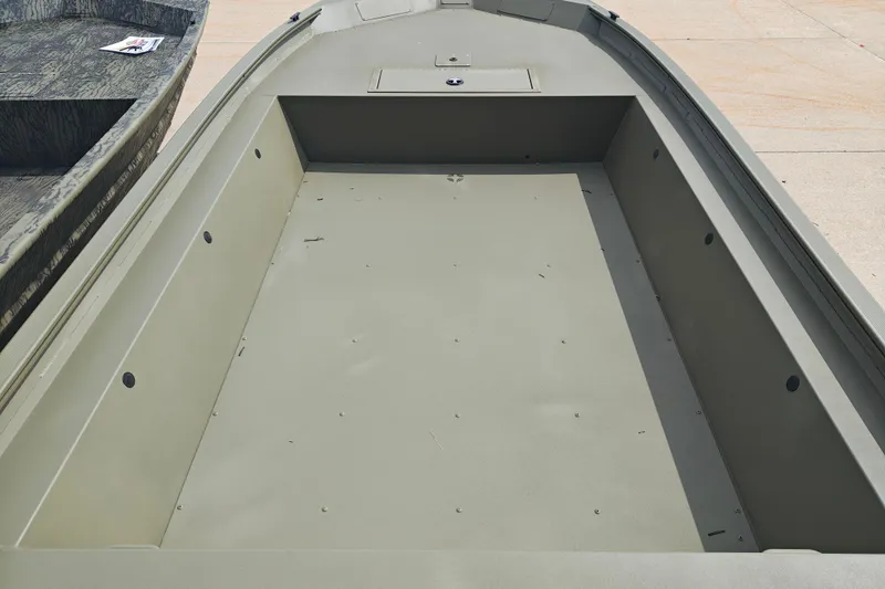 Slide: The Image of 2026 Tracker Grizzly 1754 Utility boat interior, showcasing spacious and durable design. - 20