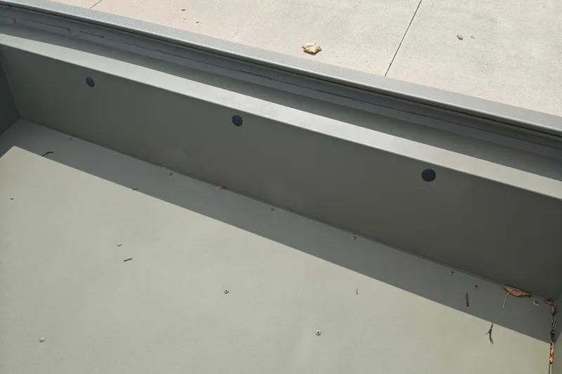 Slide: The Image of Interior view of 2026 Tracker Grizzly 1754 Utility boat, showcasing durable construction. - 21