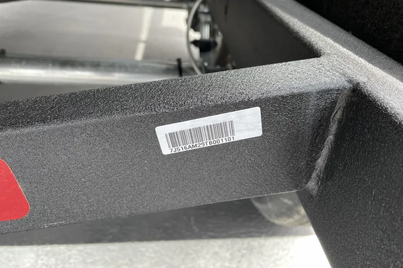 Slide: The Image of Barcode on 2026 Nitro Z21 XL boat trailer frame, close-up view. - 140