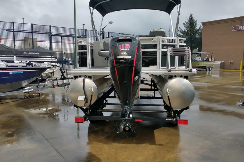 Slide: The Image of 2026 Sun Tracker Fishin' Barge 20 DLX pontoon boat with Mercury 115 outboard motor. - 5