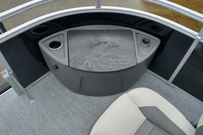 Slide: The Image of 2026 Sun Tracker Fishin' Barge 20 DLX interior with wet console and seating. - 8