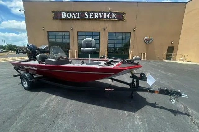 The Image of 2026 Tracker Bass Tracker Classic XL boat parked outside a boat service center. - 0