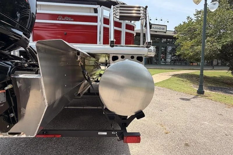 Slide: The Image of 2026 Sun Tracker Fishin' Barge 22 XP3 rear view, showcasing pontoon and motor details. - 6