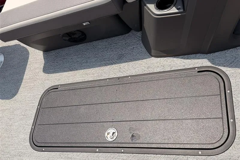 Slide: The Image of Deck storage compartment on 2026 Sun Tracker Fishin' Barge 22 XP3 pontoon boat. - 19