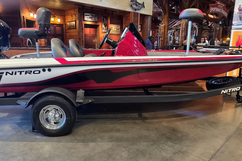 The Image of Red and white Nitro Z17 boat on display indoors, 2026 model. - 0