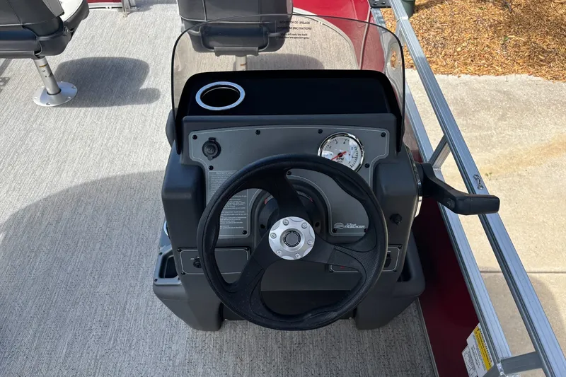 Slide: The Image of Steering console of 2026 Sun Tracker Bass Buggy 16 XL Select pontoon boat. - 13