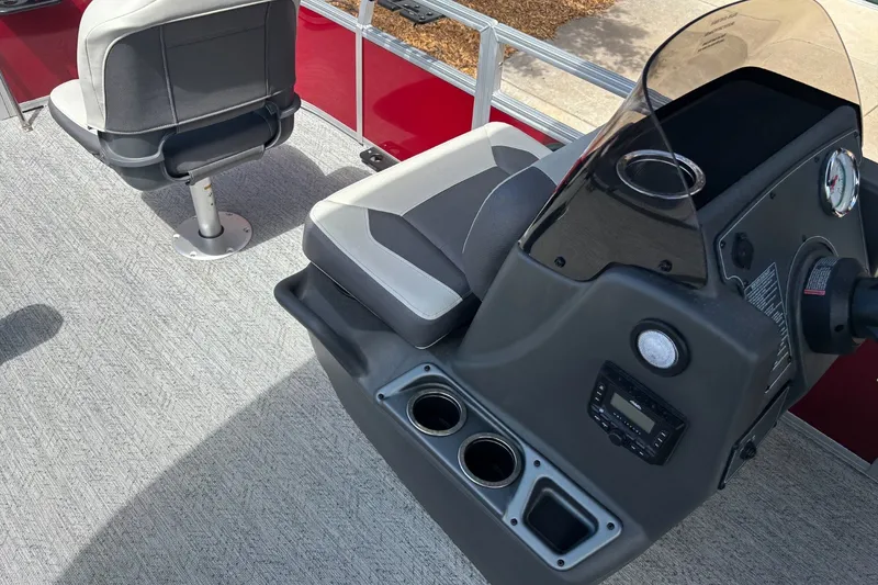 Slide: The Image of Interior of 2026 Sun Tracker Bass Buggy 16 XL Select pontoon boat with seating and console. - 14